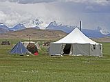 Tibet Kailash 04 Saga to Kailash 16 Paryang Nomad Tent with Nepal Mountains To the south of the Tibetan town of Paryang (4590m), a nomad tent has a great view of the peaks of Nepal�s Shey Phoksumdo  National Park in the area called Dolpo. Kanjiroba (6883m) is the highest peak in the park.